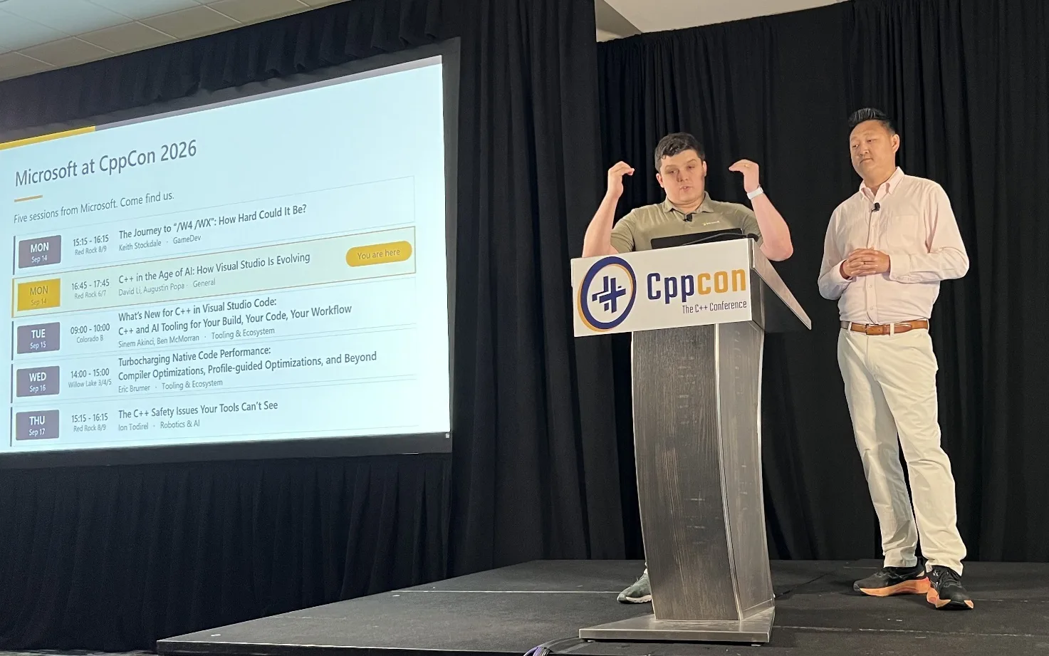 Augustin Popa (left) and David Li (right) presenting their session on Visual Studio.
