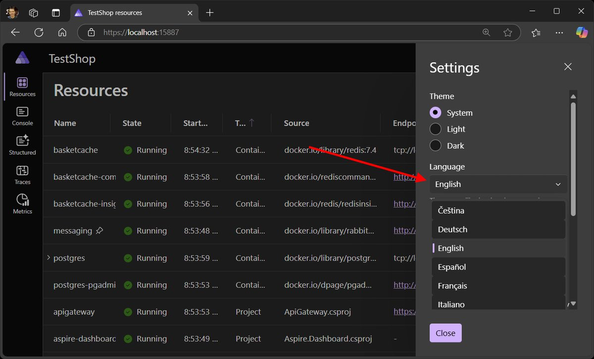 A screenshot of the .NET Aspire dashboard showing the new flyout menu to change language.