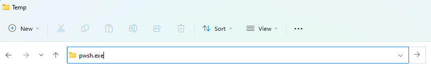 The Windows Explorer address bar, with the path replaced with "pwsh.exe"