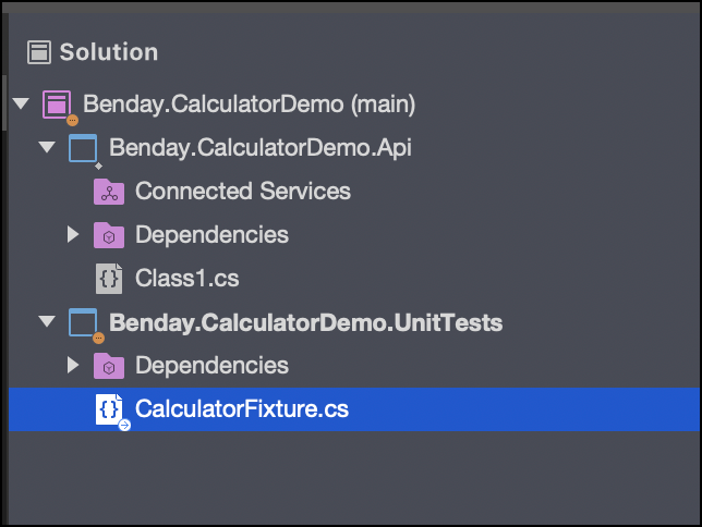 Solution Explorer shown, with CalculatorFixture.cs class selected.