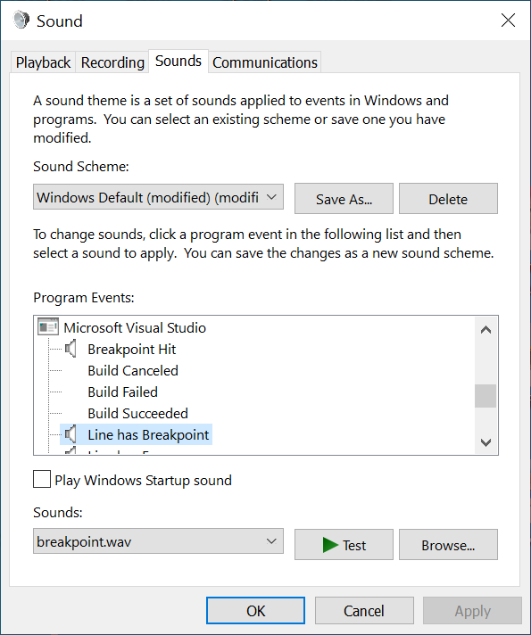 The Sound Control Panel dialog in Windows. The Microsoft Visual Studio events are scrolled into view and the "Line has Breakpoint" is selected. Below it, the Sounds field shows that "breakpoint.wav" is assigned to that event.