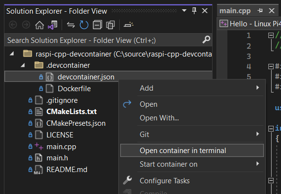 Solution explorer with context menu open on devcontainer.json file under .devcontainer folder. New option focused in context menu, Open container in terminal.