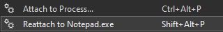 A view of the reattach to process menu item showing the reattach process name next to it. eg. Reattach to Notepad.exe