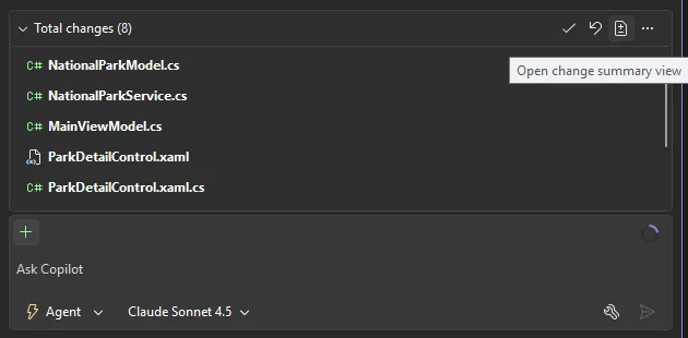 The Copilot Chat working set listing eight changed files (model, service, view model, XAML, and code-behind) with an Open change summary view tooltip highlighted in the toolbar.